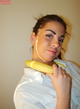 Nude woman over 50 strips and plays with banana in hot pics