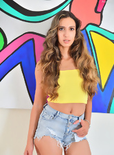 Hot mom with curly hair takes off yellow top and denim shorts