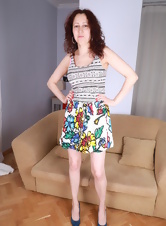 Redheaded mom in colored skirt very sexy porn pictures
