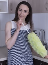 Naked housewife shows her hairy pussy in the kitchen